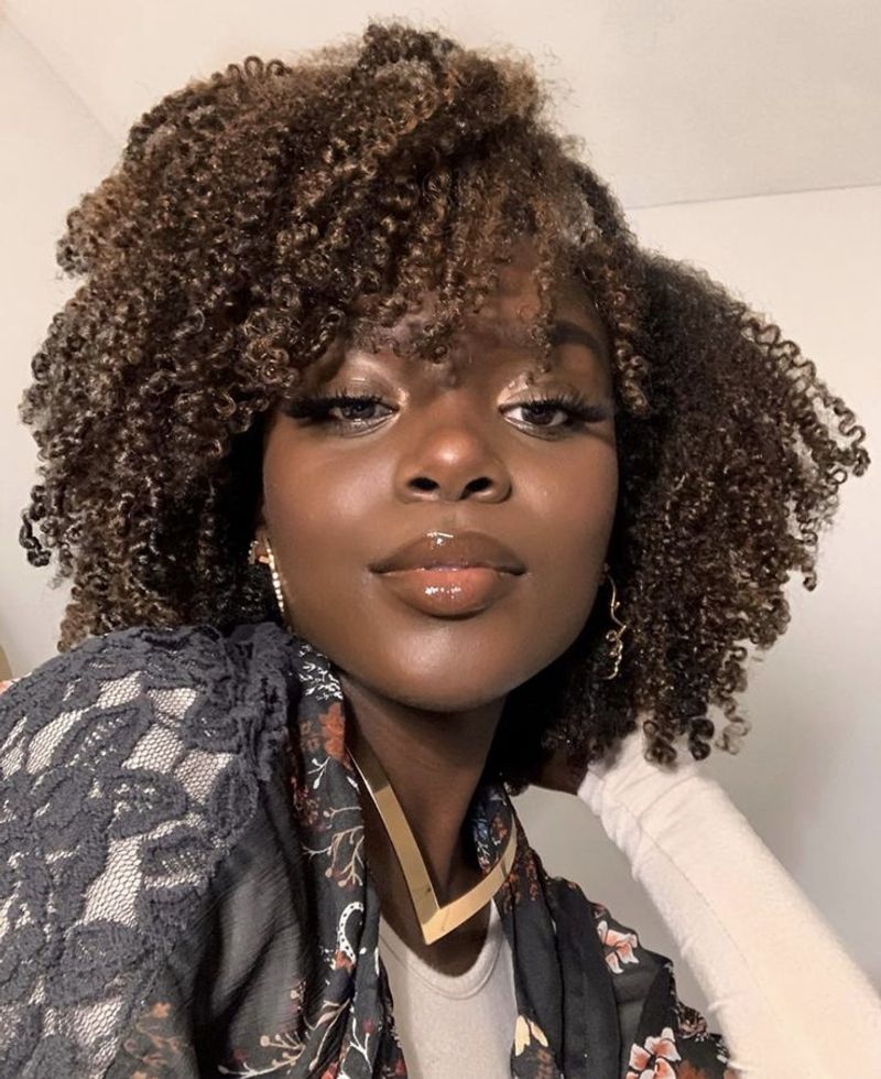 Dated: Tightly Coiled Synthetic Curls