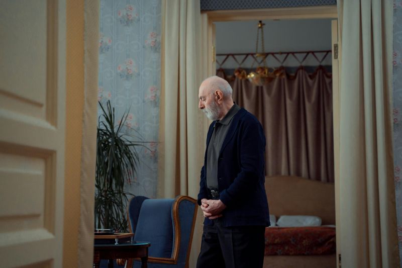 Standing When Someone Enters the Room