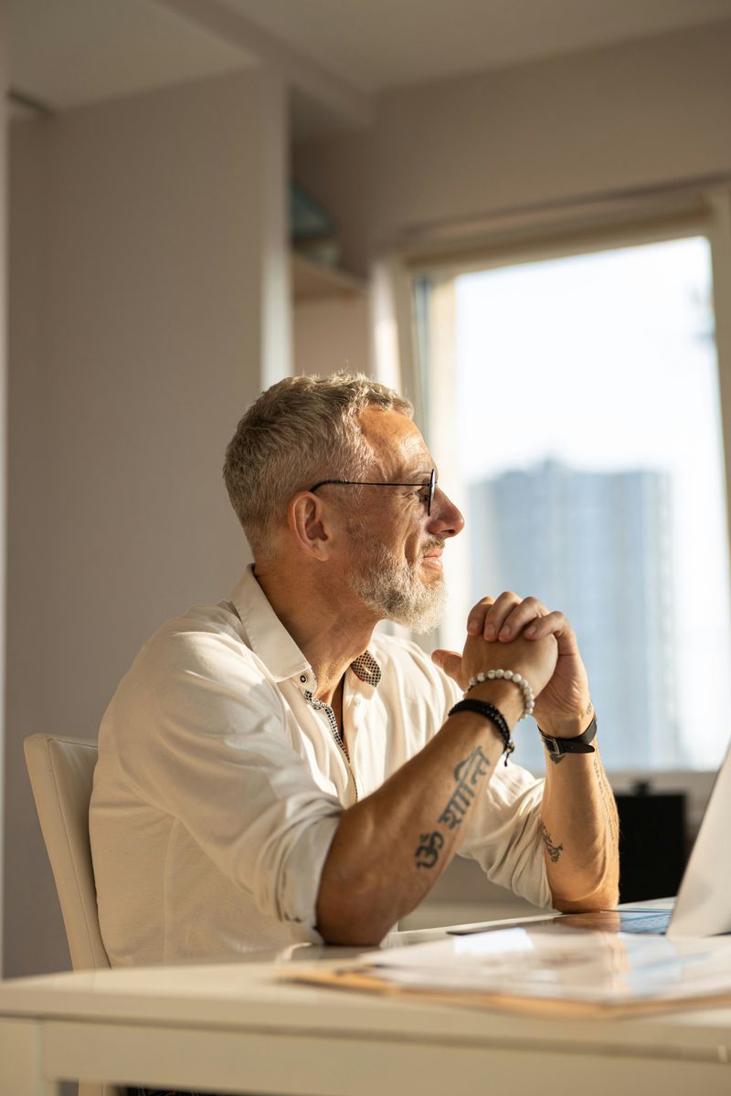 Neglecting Emotional Growth https://unsplash.com/photos/waist-up-photo-of-a-worker-in-glasses-sitting-with-elbows-on-the-table-and-watching-the-sun-VMDKeRO351c