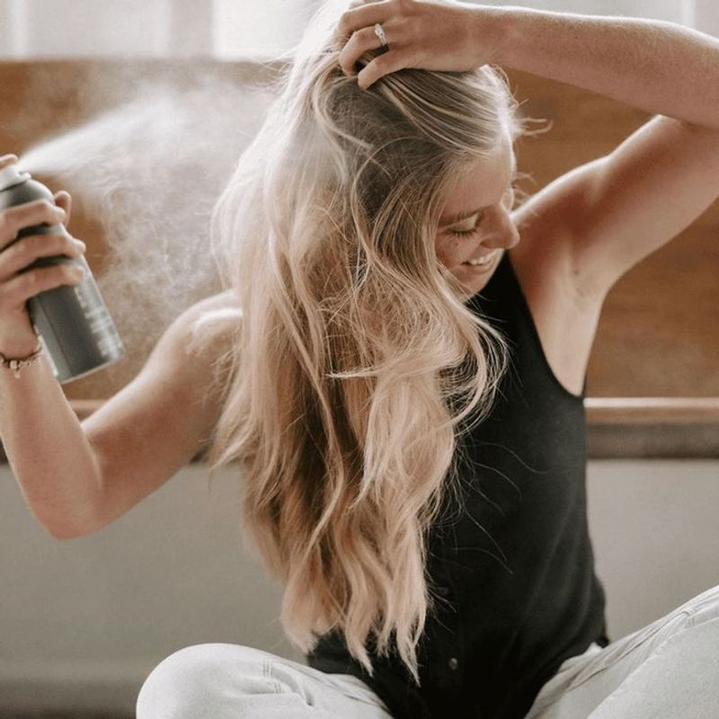 Use Dry Shampoo as a Volume Booster Between Washes