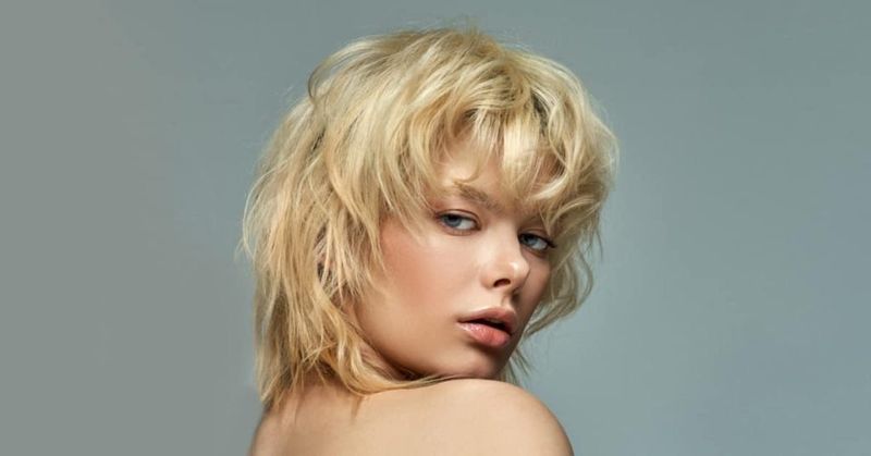 Shoulder-Length Shag with Curtain Bangs