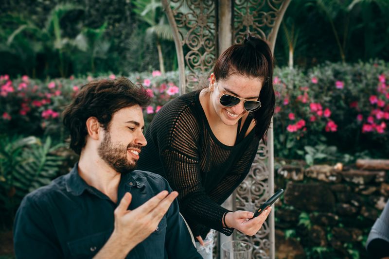 He Gets a Little Jealous (But Tries to Hide It)