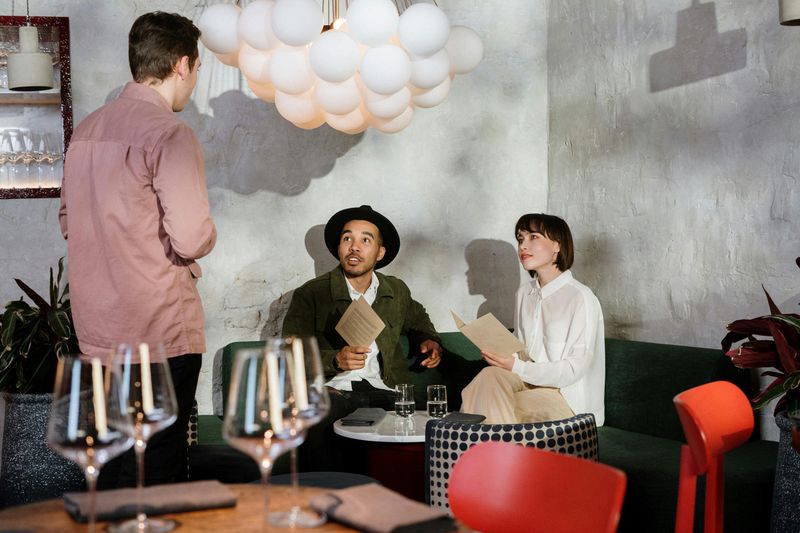 He’s rude to service staff (or “jokes” at their expense)