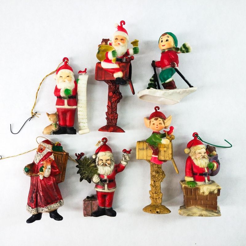 Vintage Santa figurines and elf ornaments