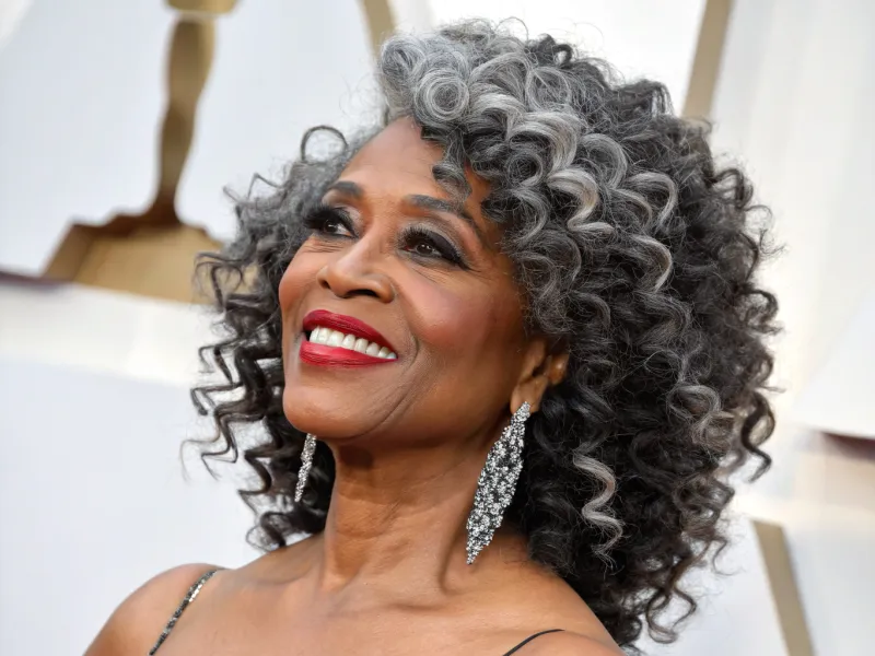 Side-Swept Curls with Bangs