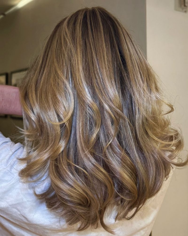 Voluminous Layers with Blowout Styling
