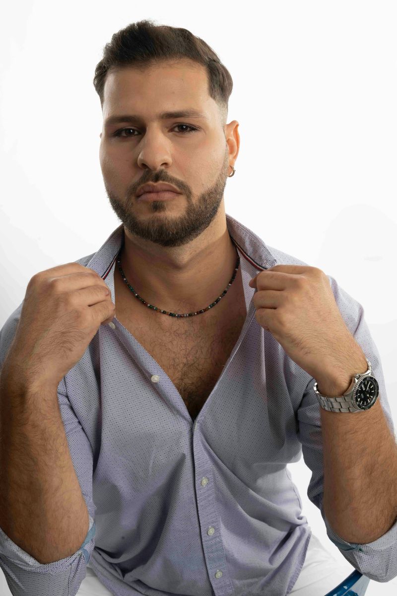 Delicate jewelry: thin chains, stacked rings, tiny bracelets