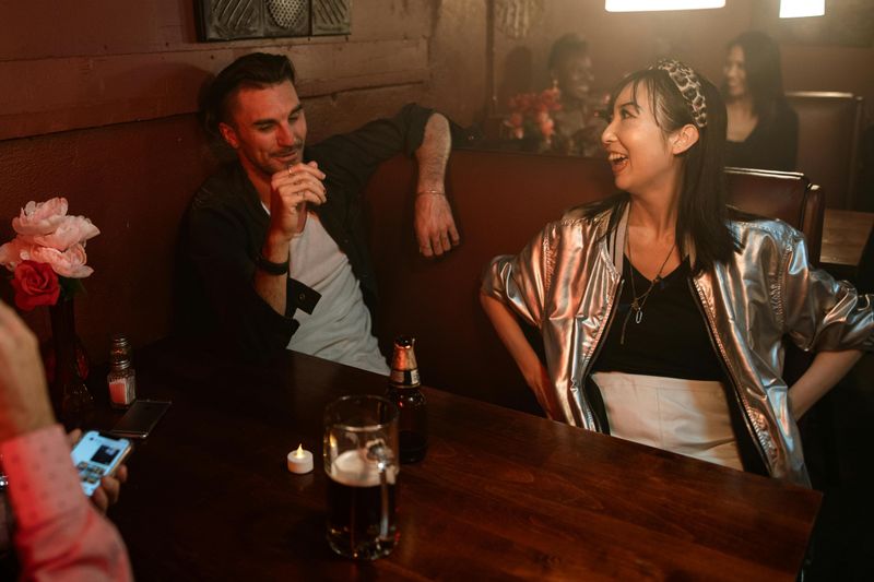 Flirts “harmlessly” with other women in front of you