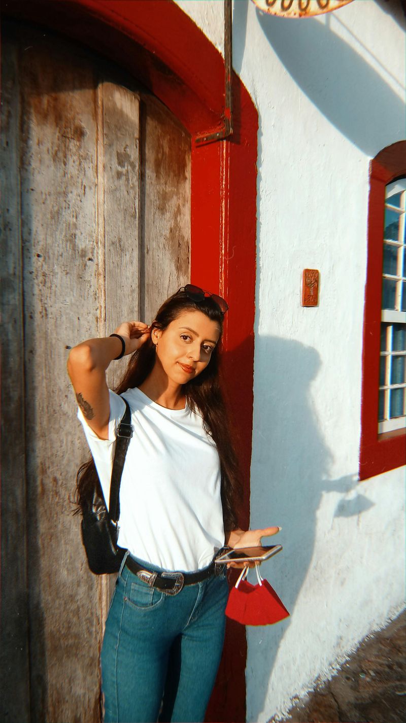 A simple fitted white T-shirt + jeans (classic, confident, not trying too hard)