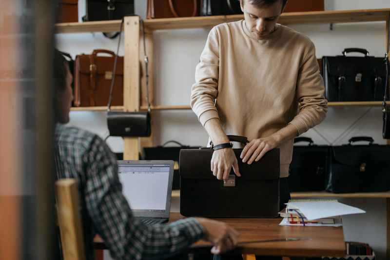 Carrying accessories that read “fashion handbag,” not “utility bag”