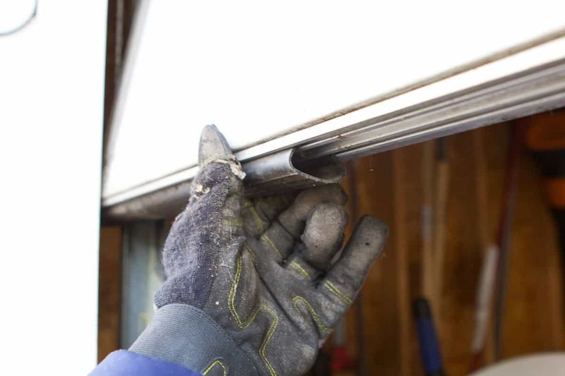 Replace Damaged Weatherstripping on Garage Doors