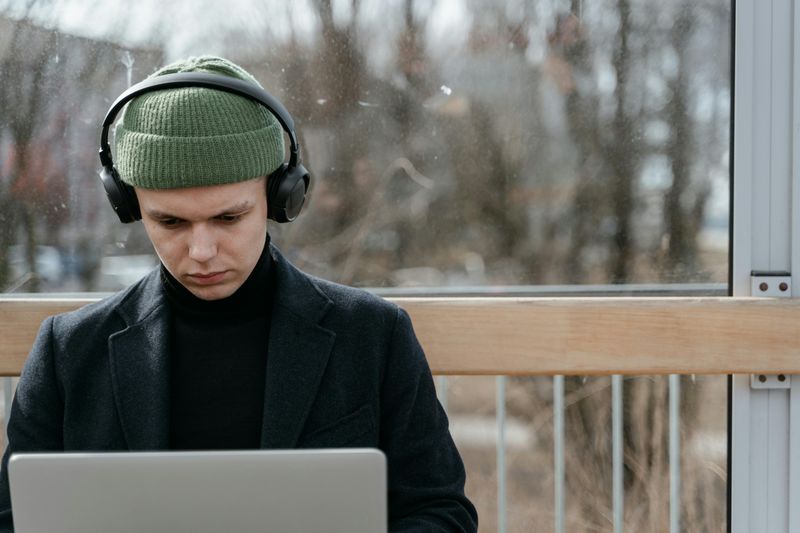 Use Noise-Canceling Headphones or Focus Music