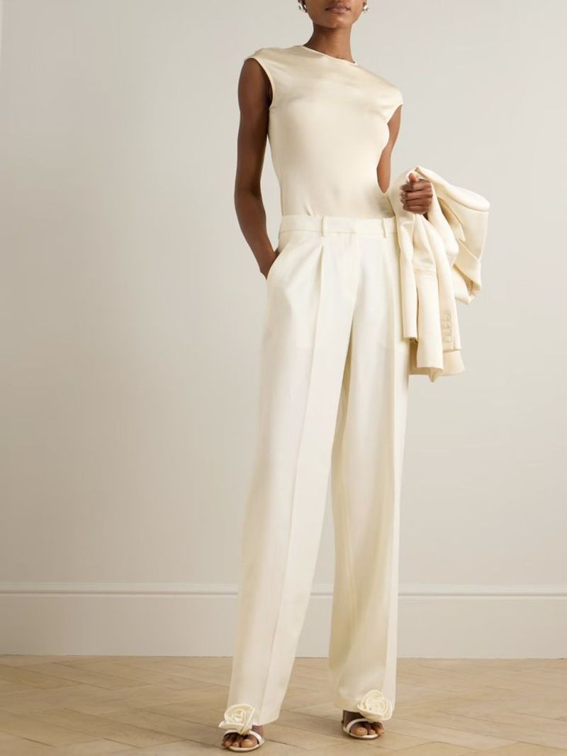 Wear high-waisted jeans or trousers