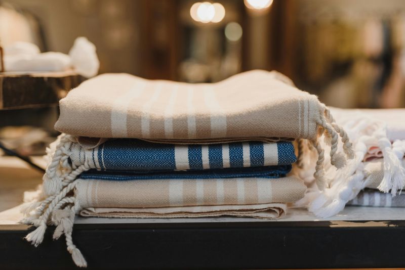 Dozens of Unused Throw Blankets