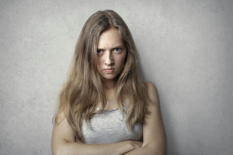 Eye Rolling or Dismissive Gestures