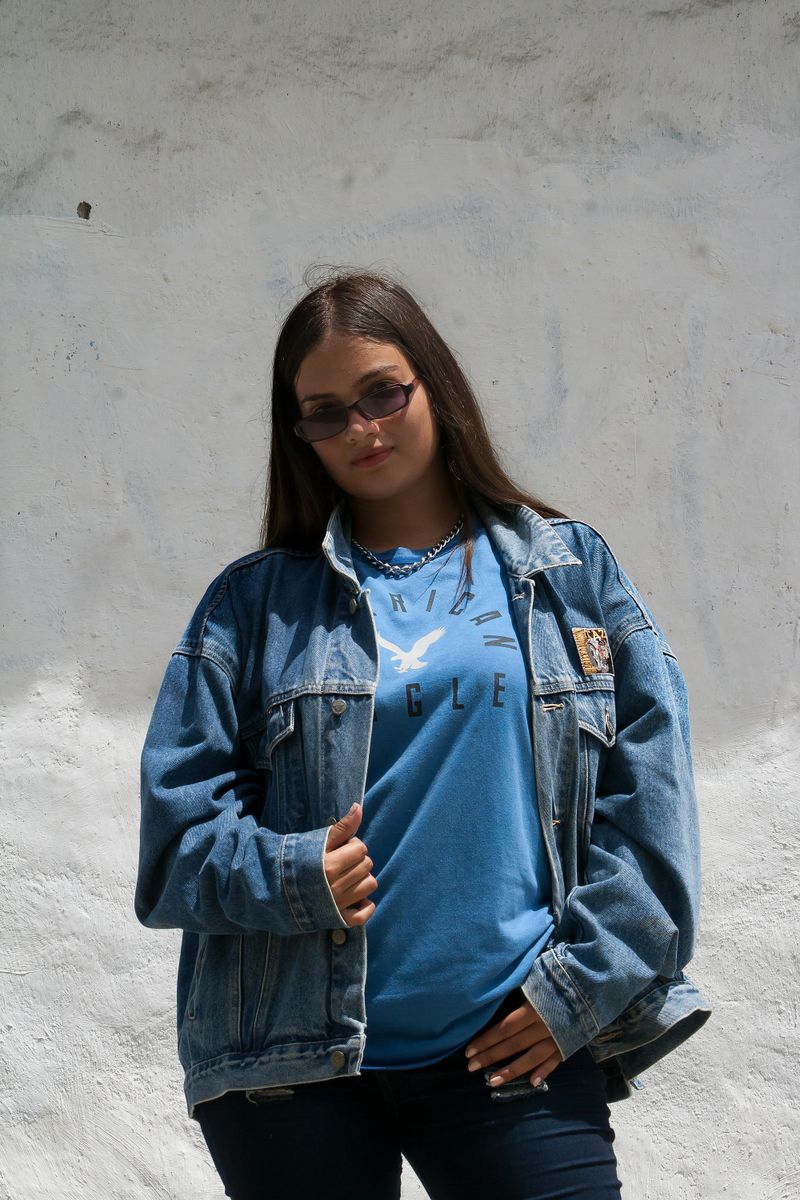 Oversized Denim Jacket with Layered Tops
