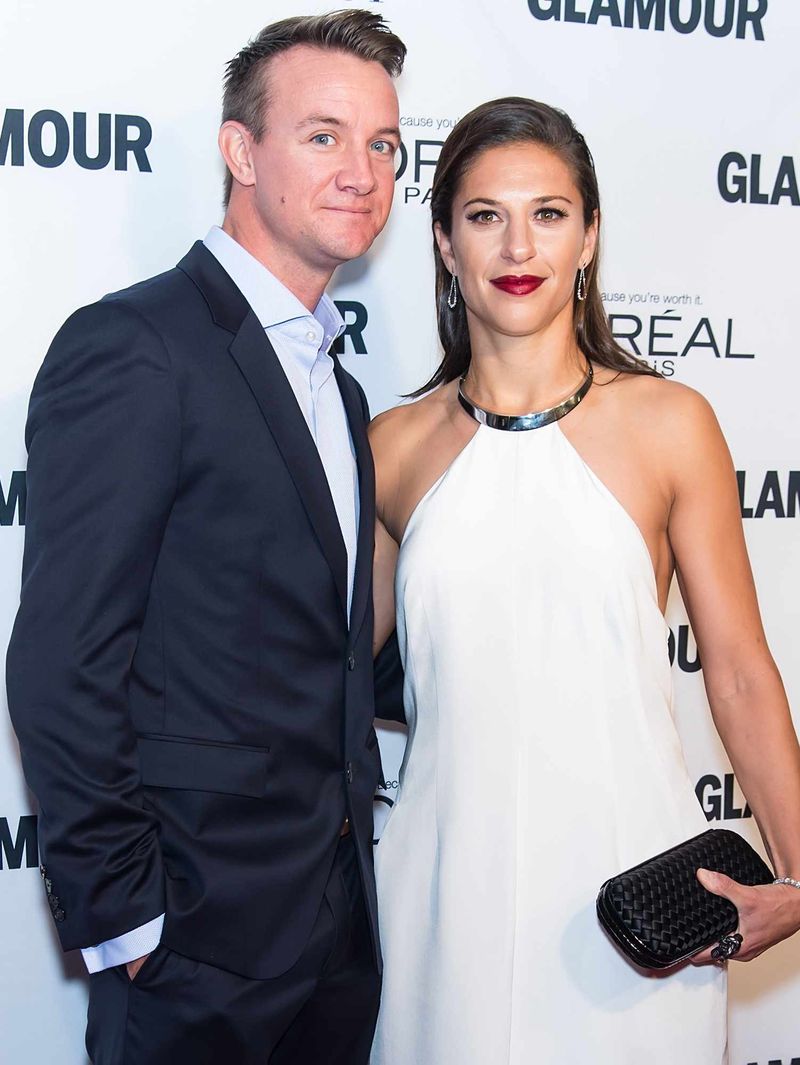 Carli Lloyd and Brian Hollins