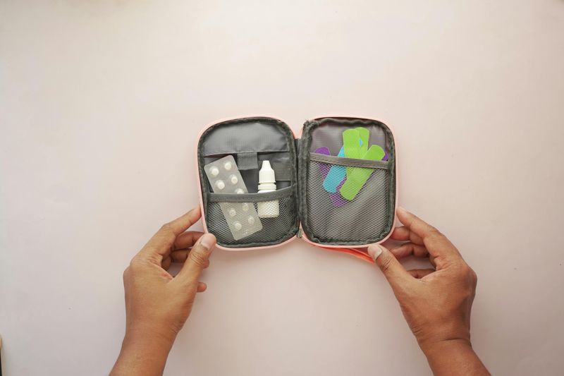 Mini first-aid kit (bandages, blister pads, antiseptic wipes)