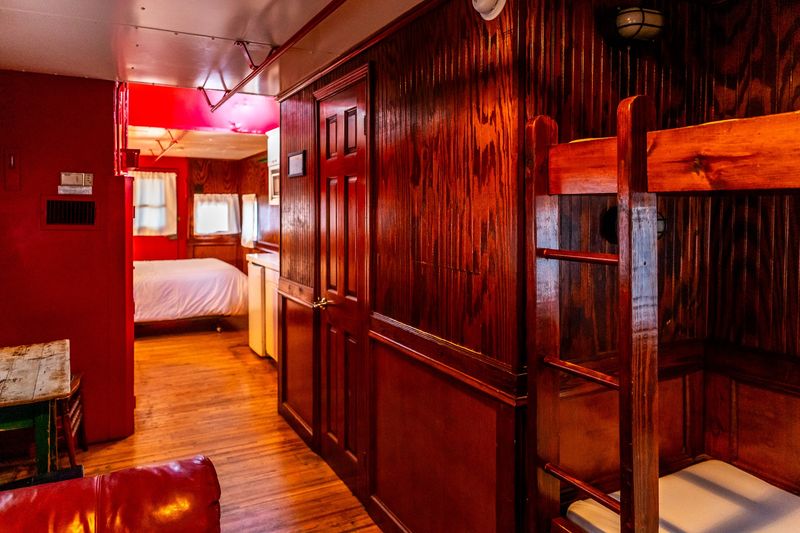 Bunks and Kitchenettes Inside the Cabooses