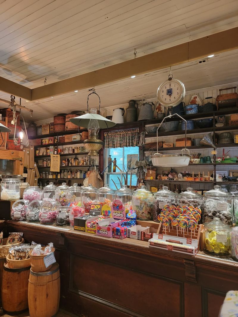 Shelves Of Old Tins Watching Over The Modern Goods