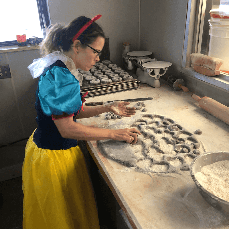 Bakers in Action Behind the Glass