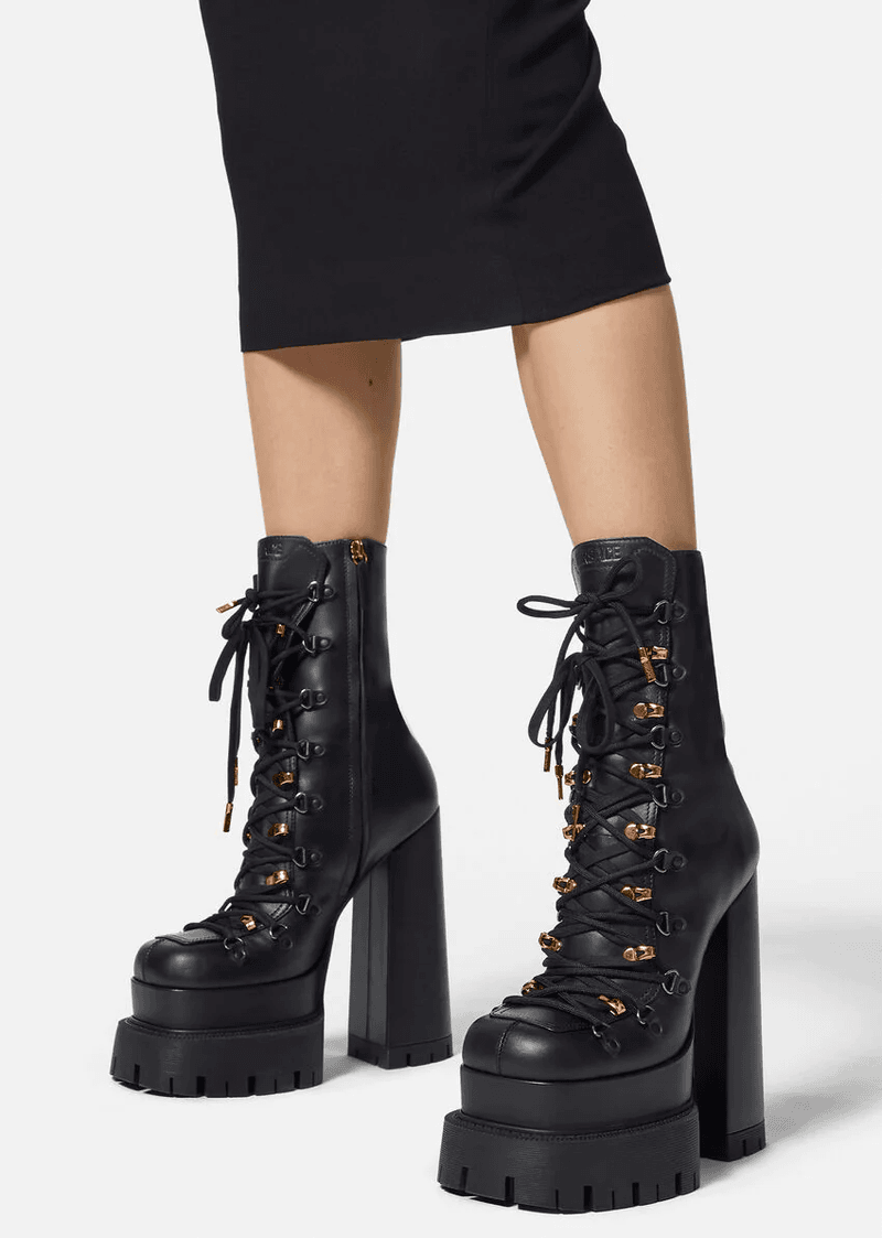 Step Up Your Winter Wardrobe with the 8 Best Boots to Wear With a Sweater Dress