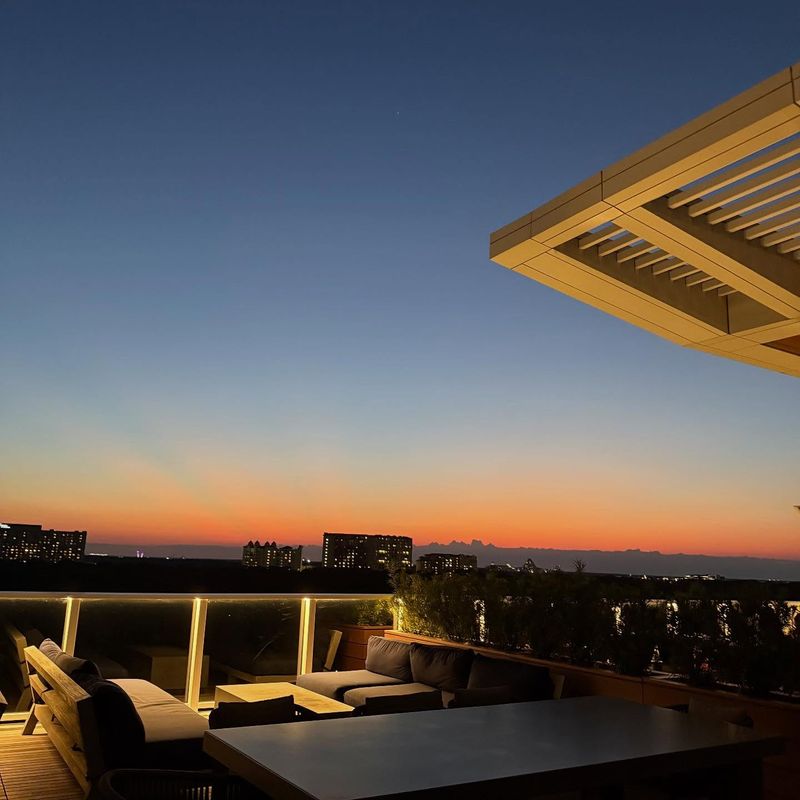 Sunset or skyline view from lakeside rooftop bars