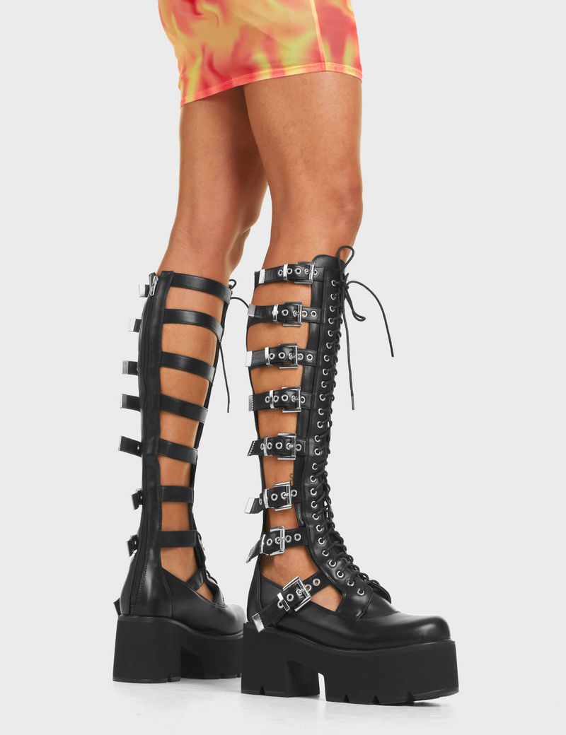 Knee-High Boots with Loud Prints or Buckles