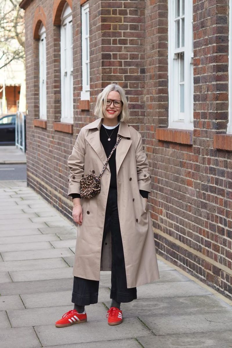 With Cropped Trousers and a Trench Coat