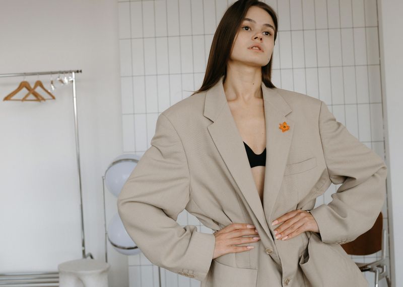 Wearing worn-out or ill-fitting clothes