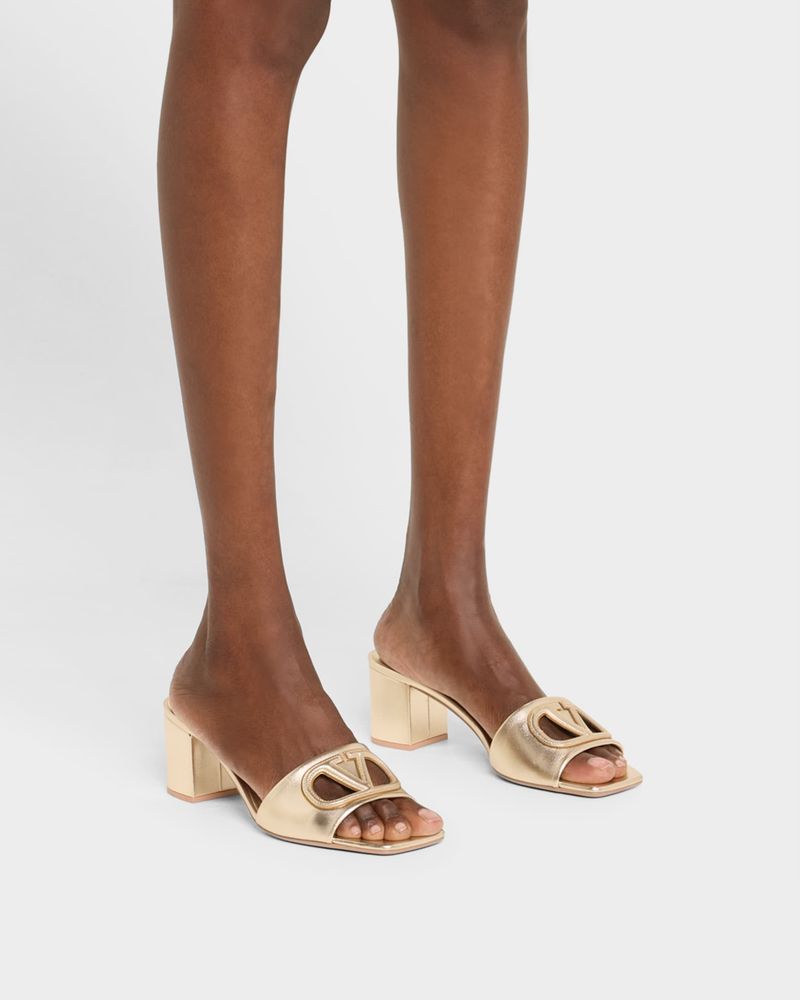 Suede or Leather Mules with a Folded or Cutout Design
