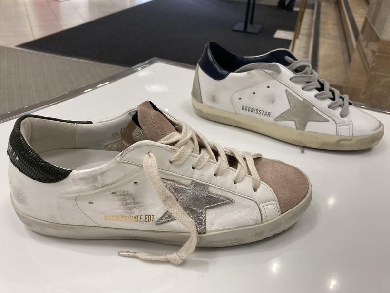 Chunky Trainers with Untied Laces and Grass Stains