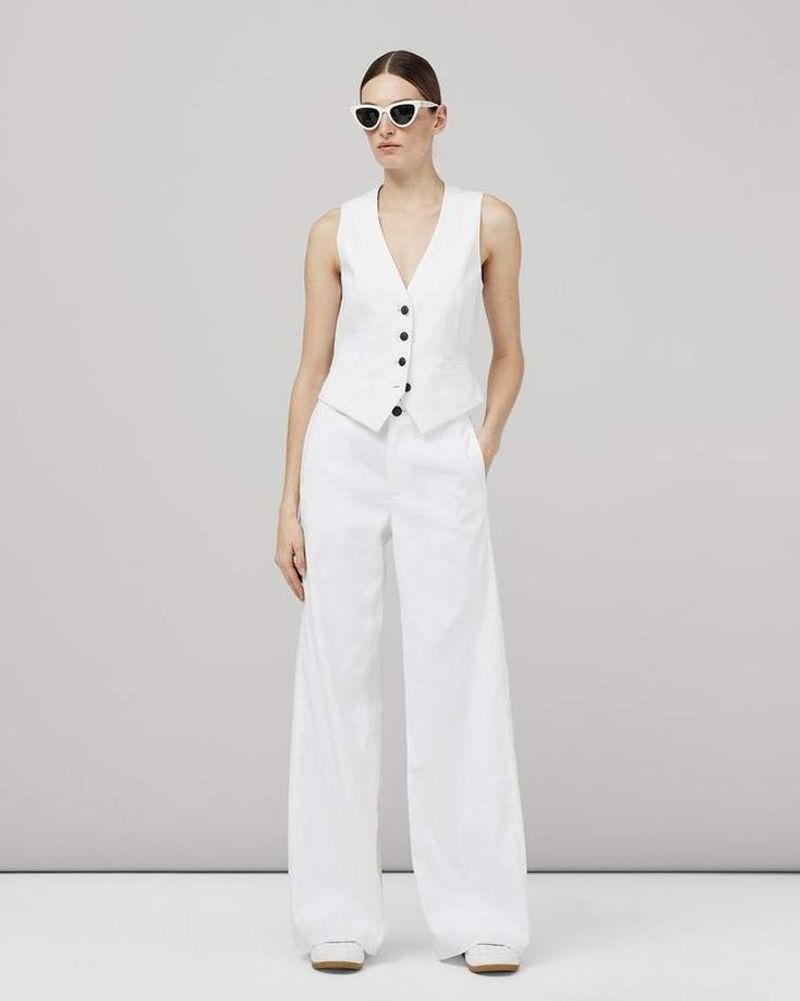 With Linen Trousers and a Structured Vest