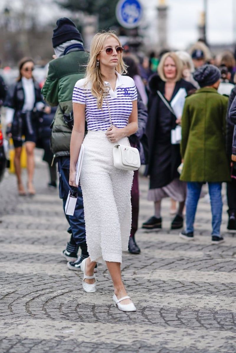 With High-Waisted Trousers and a Fitted Tee
